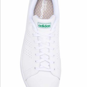 Adidas white sneaker with green detail